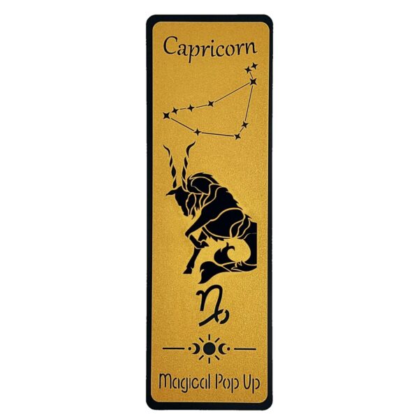 Marcador de livro com signo capricórnio cortado em papel dourado